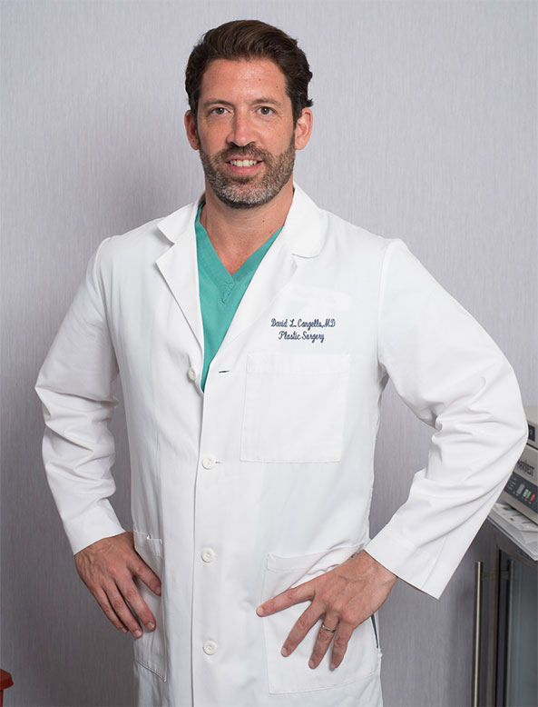 Dr. Cangello in a white lab coat