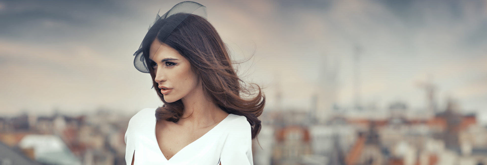 beautiful urban woman in white dress